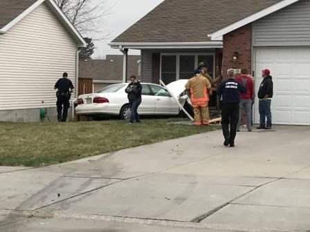 UPDATE: Car hits Lincoln house, driver charged with DUI