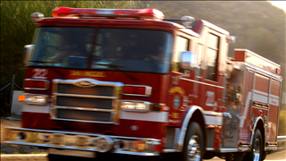 2 firefighters injured when firetruck rolls on way to blaze