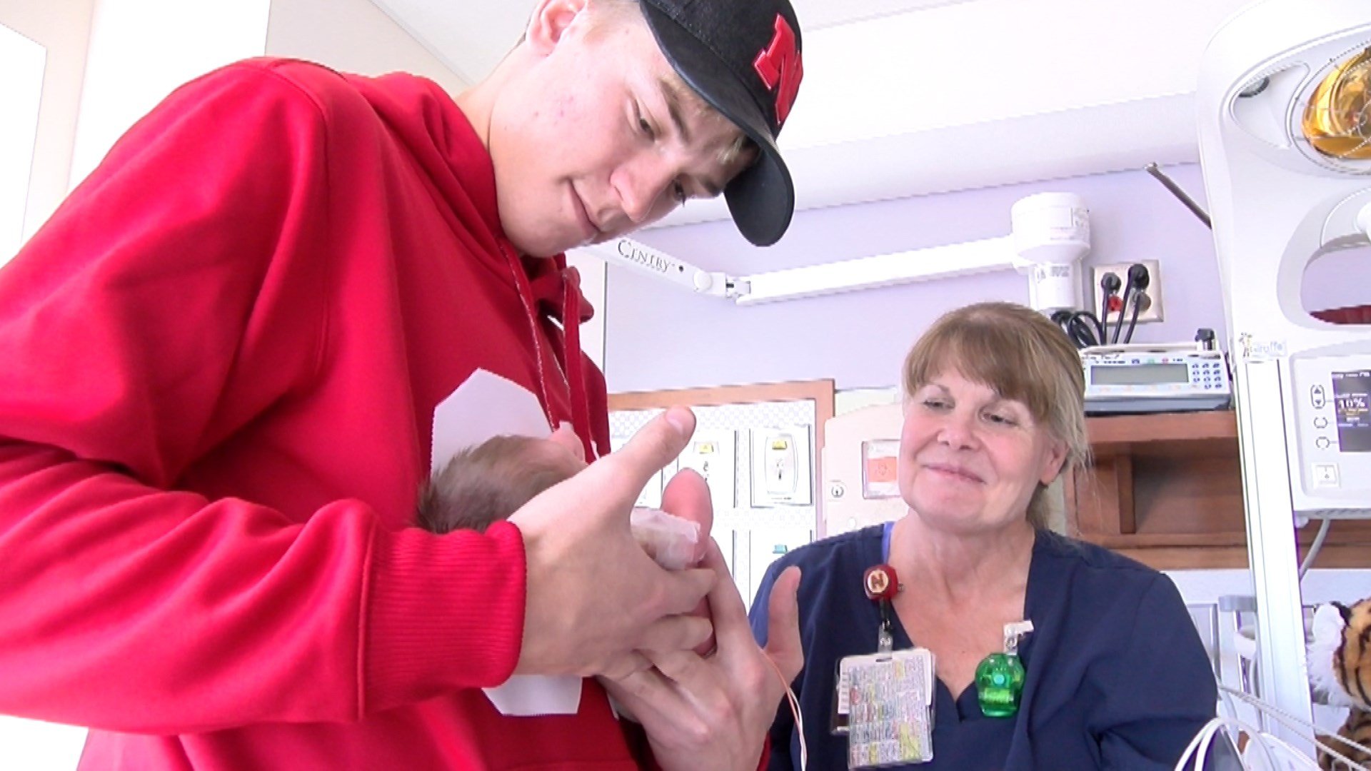 Husker Football players visit hospital patients