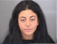 Driver accused of fatally hitting girl surrenders