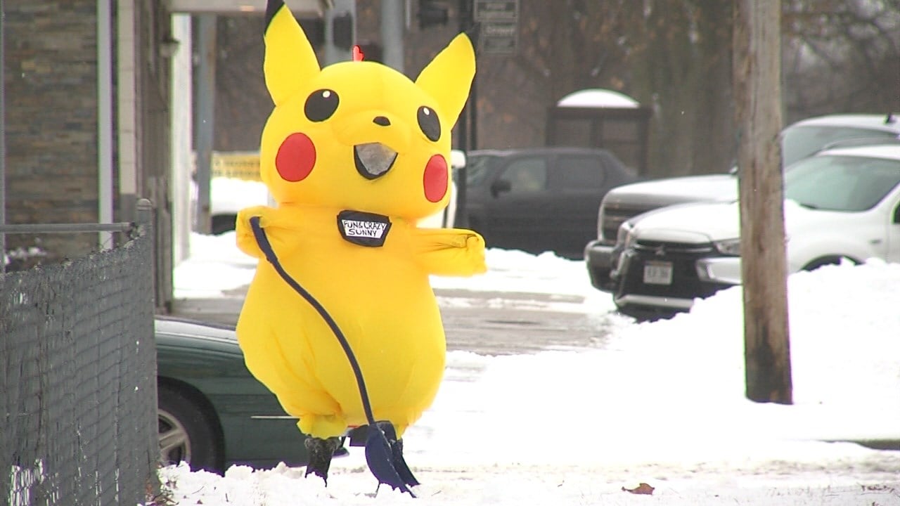 Lincoln woman wearing Pikachu costume shovels snow for people in need